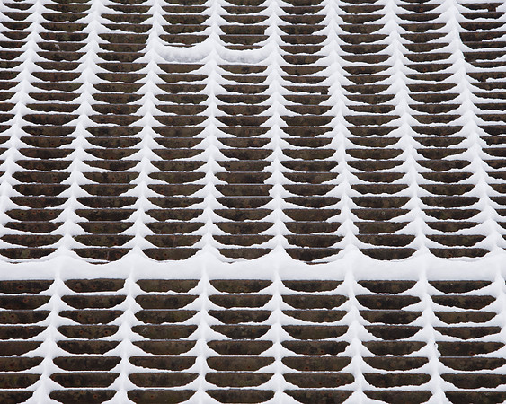Snow Covered Metal Grate